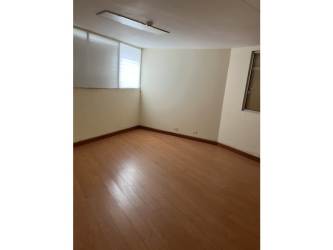 Expansive open storage interior with high ceilings inside La Locería warehouse