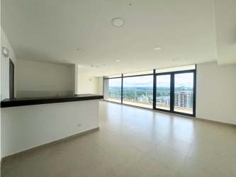Bright living room with floor-to-ceiling windows and city view in El Cangrejo, Panama City