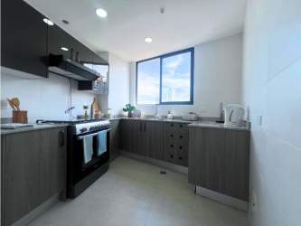 Walk-in closet with large window, shelving and storage PH Cranc Tower Panama