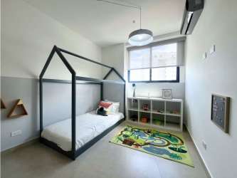 Children's room with house-frame bed, large window in El Cangrejo Panama
