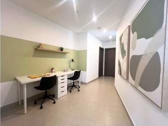 Contemporary enclosed kitchen with granite countertops at Cranc Tower Panama