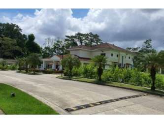 Spacious hall with staircase, arched doorway in luxury Camino de Cruces Panama home