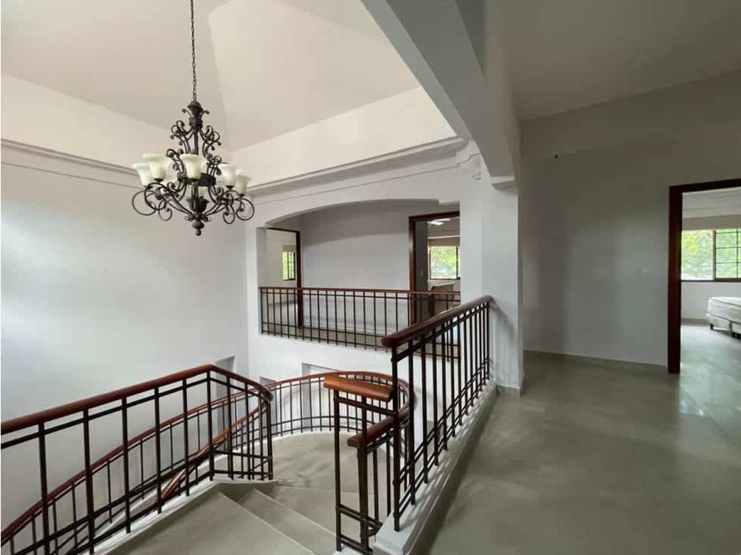 Spacious living room with large windows, garden views PH Camino de Cruces Panama