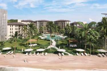Contemporary beachfront condominium with balconies at Olas del Mar Playa Caracol