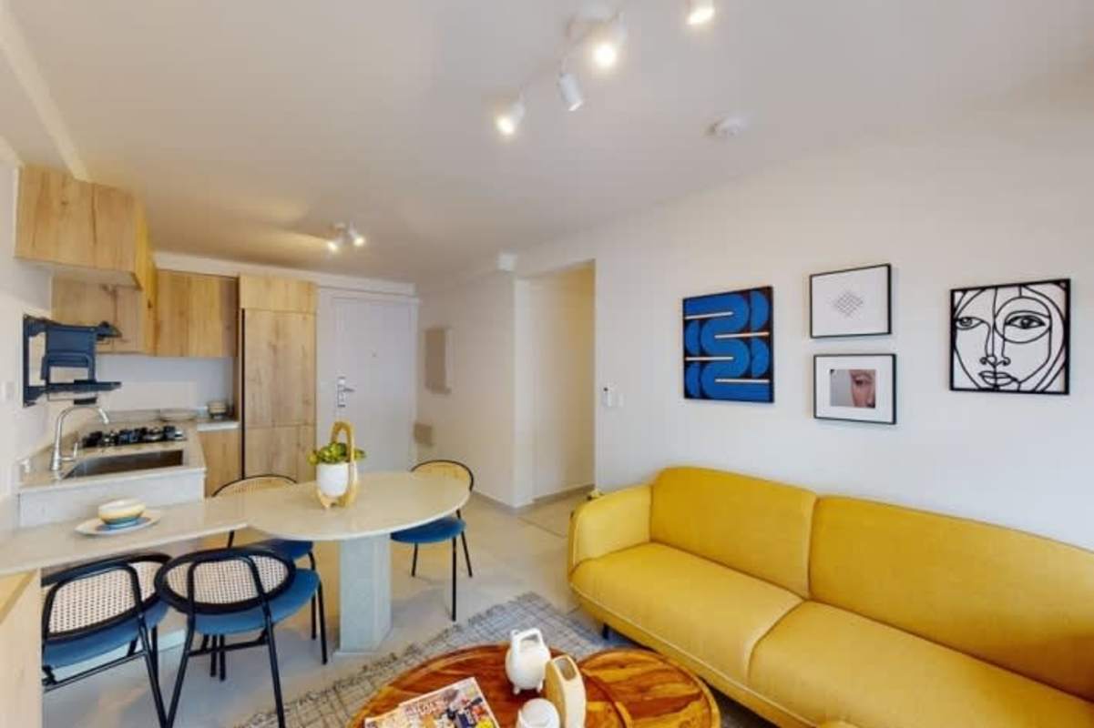 Modern apartment open-plan space with dining and living room at Armonía Bella Vista