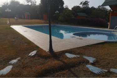 Swimming pool and children’s pool with dolphin fountain Hacienda La Florenciana San Carlos Panama