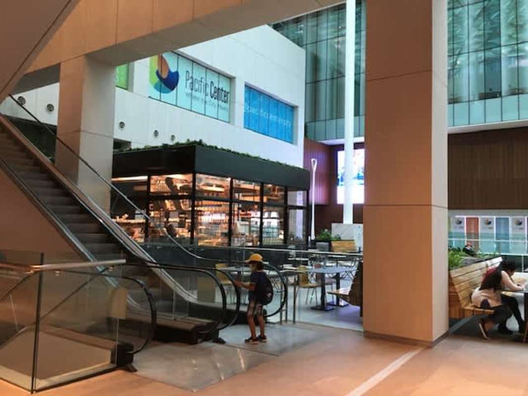 Pacific Center commercial lobby with airport style entry, pharmacies, ATMs and glass doors in Punta Paitilla Panama