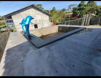 Unfinished rectangular pool with garden view Cordillera Chiriquí Panama