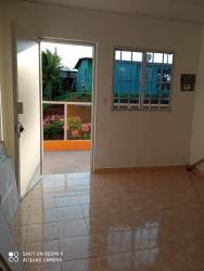 Interior space showing closet louvered door minimalist style rental house Panama Oeste