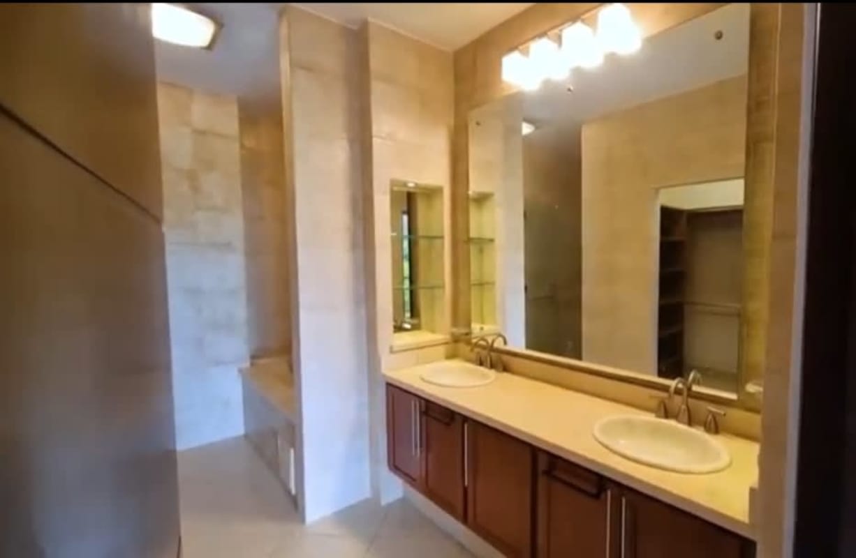 Luxury master bathroom with double sinks walk-in shower jacuzzi tub embassy club clayton