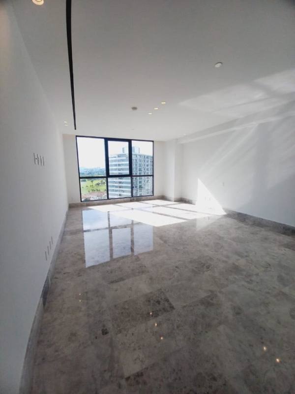 Elegant family den and dining area with marble floors in Empire Residences Santa María Panama City