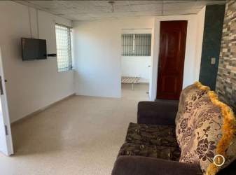 Contemporary bathroom with walk-in shower, pedestal sink, tiled walls San Judas Tadeo