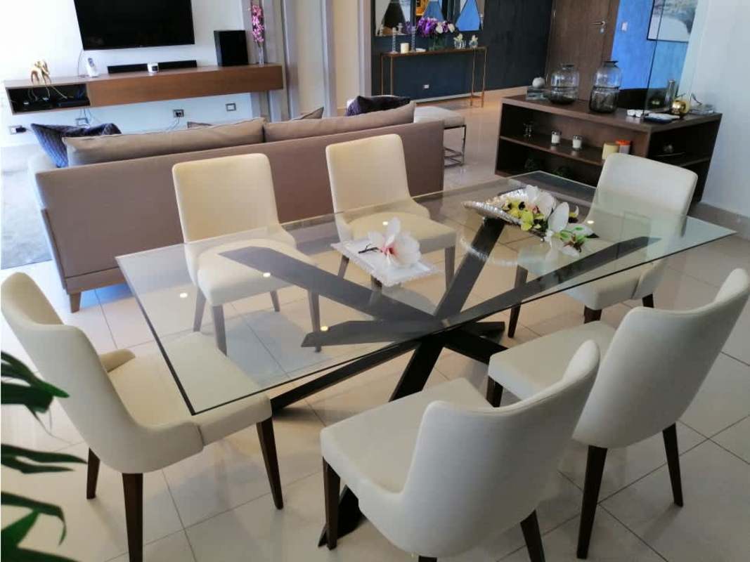 Bright spacious open-plan living dining room with modern decor at PH Bali Costa del Este