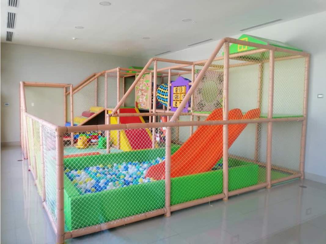 Aerial of waterfront parks, sports courts, amenities near PH Bali Costa del Este Panama City