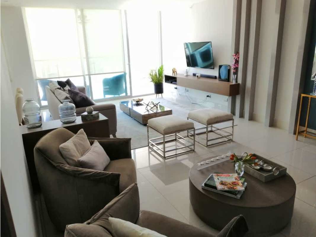 Bright modern kitchen with quartz tops and breakfast bar at PH Bali Costa del Este