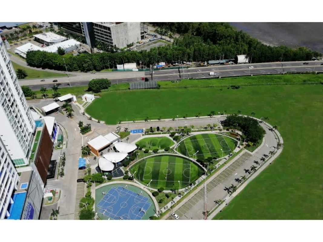 Spacious living and dining room with modern decor large windows city views PH Bali Costa del Este