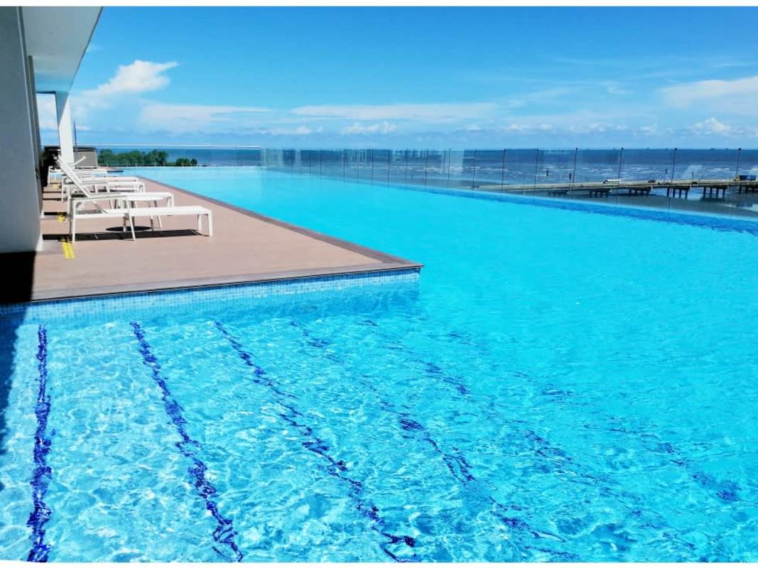 Colorful children's playroom with slides and ball pits at PH Bali Costa del Este Panama City