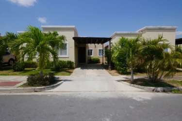 Remodeled kitchen with enclosed glass wall and induction cooktop Paraíso Village Coronado