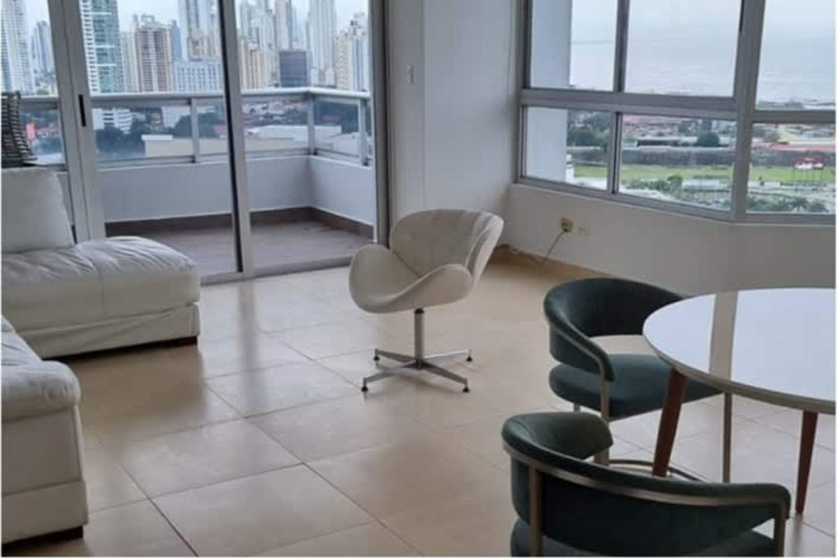 Elegant guest bathroom with marble tile, modern vanity and chrome fixtures in Pacific Point Tower Panama