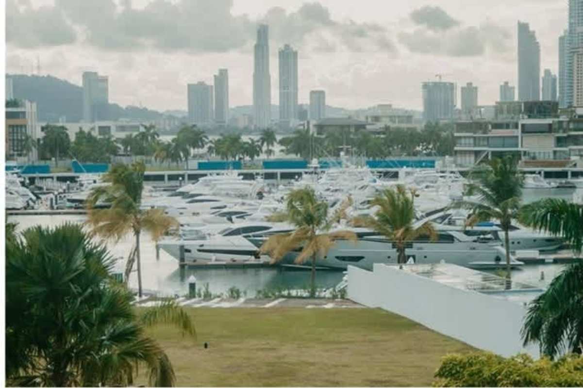 Exclusive private marina yachts skyline backdrop lush gardens Ocean Reef Islands Panama