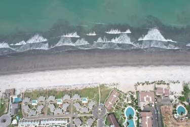 Aerial view of The Tides Playa Caracol beachfront villas and coastline Punta Chame Panama