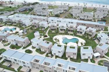 Aerial of beach club, pool, garden common areas at The Tides Playa Caracol Chame Panama