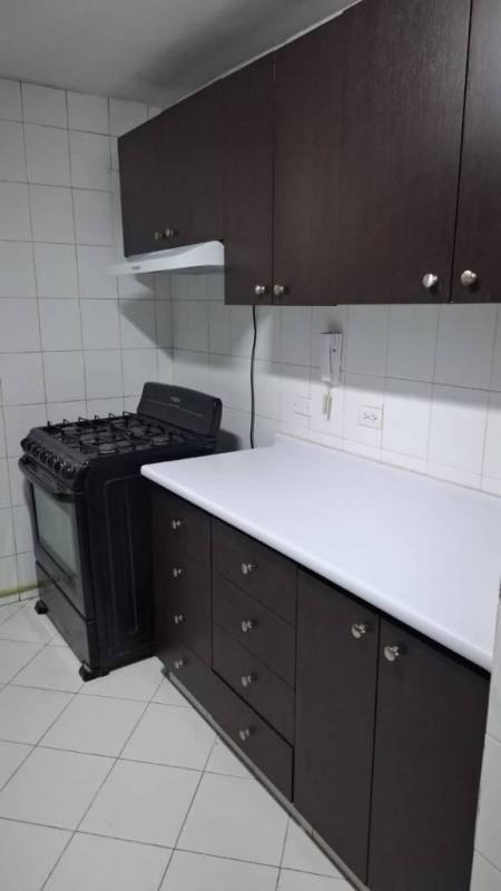 Living room with tiled flooring, AC, city view windows PH Ocean Sky Punta Paitilla Panama