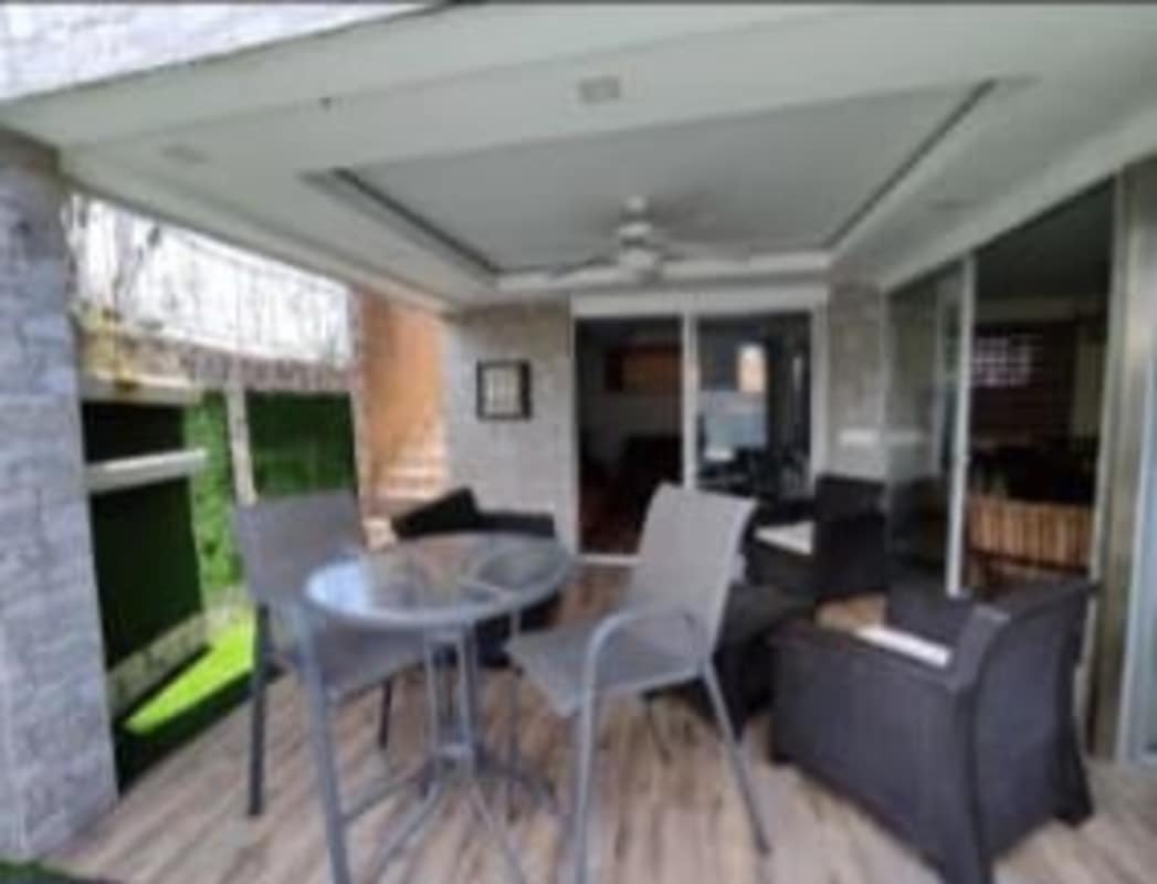 Covered balcony overlooking residential neighborhood in El Bosque Panama City
