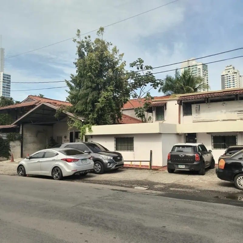 Traditional kitchen with wood cabinets and tiled backsplash inside commercial listing San Francisco Panama