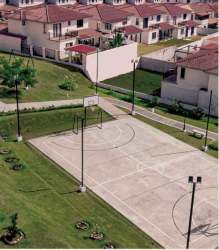 Aerial photo of Costa Verde community with recreational basketball court and landscaped areas Panama