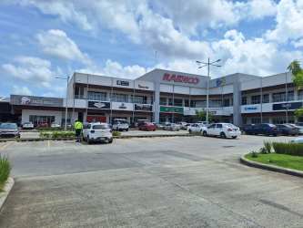 Facade of Paseo Costa Verde Plaza commercial center with parking La Chorrera Panama