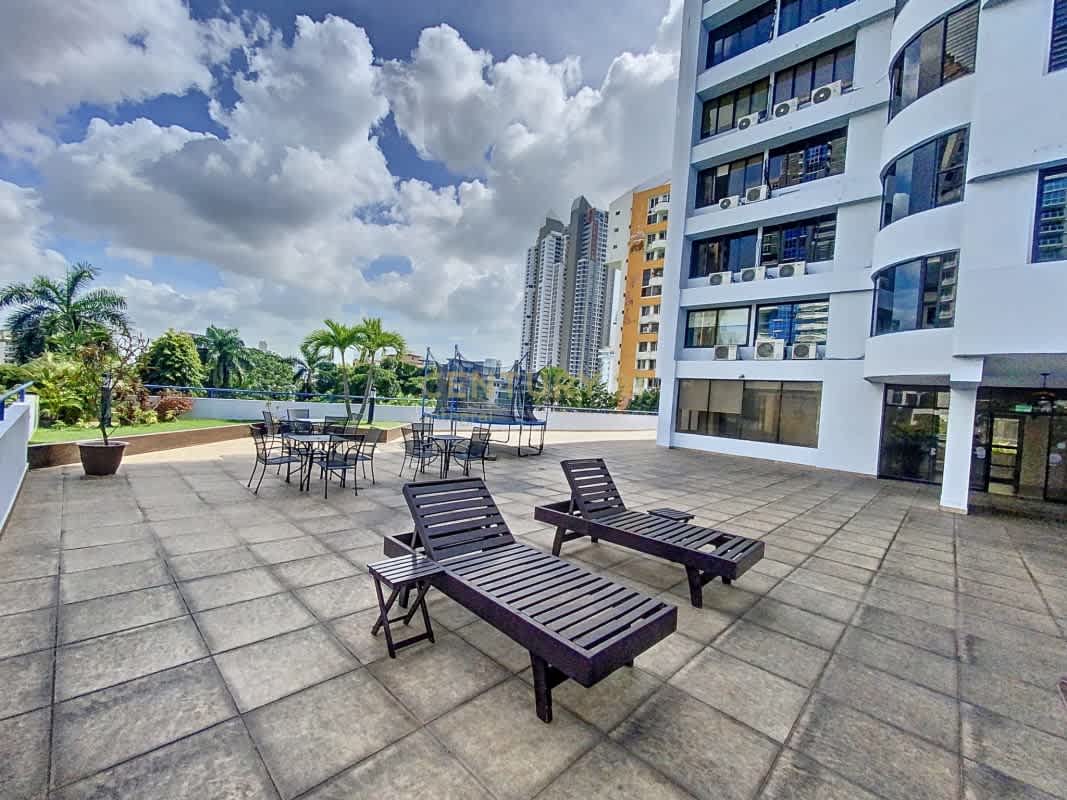 Formal dining area with panoramic windows and chandelier PH Terrazas del Cangrejo Panama City