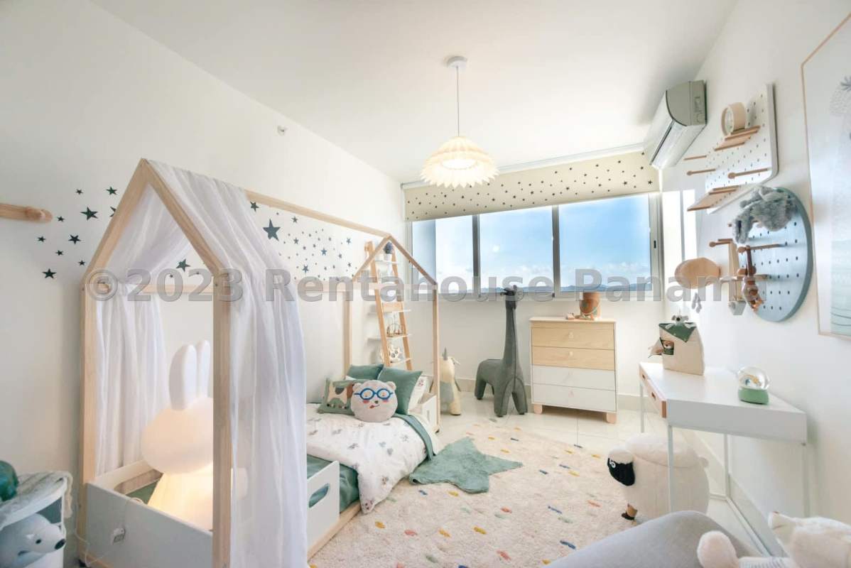 Rooftop pool with glass railing and panoramic skyline view in PH Pacific Park Edison Park Panama City