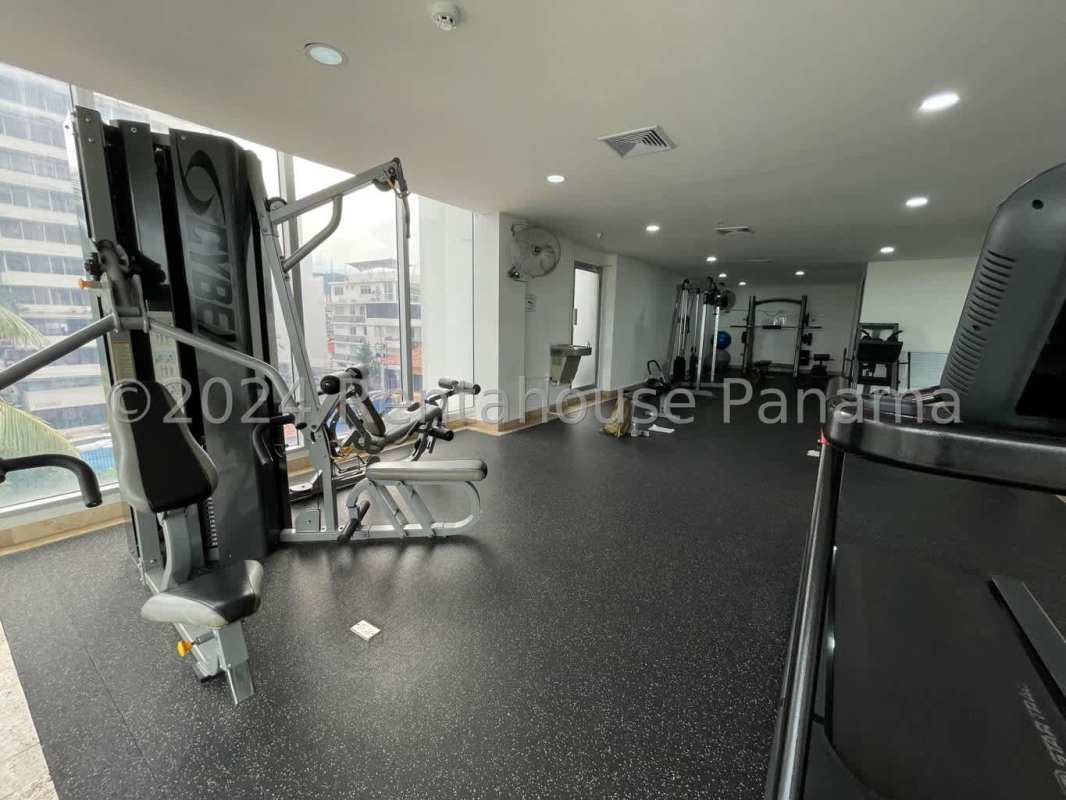 Indoor swimming pool with city views at PH Rivage Avenida Balboa Panama City