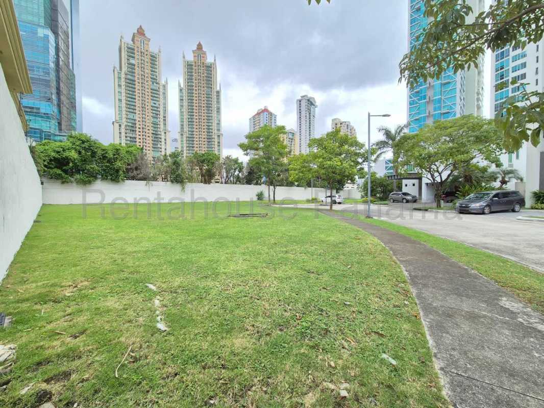 Entrance guardhouse of PH Gold Point luxury residential Punta Pacífica with high-rise skyline