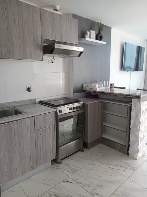 Ensuite bathroom with designer tiles, glass shower at PH The Sands Panama City