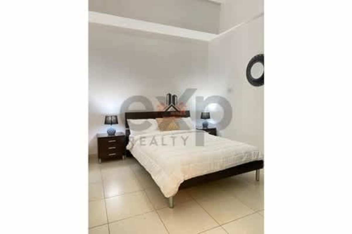 Minimalist bedroom with ocean and skyline views at luxury apartment PH Waters on the Bay Panama