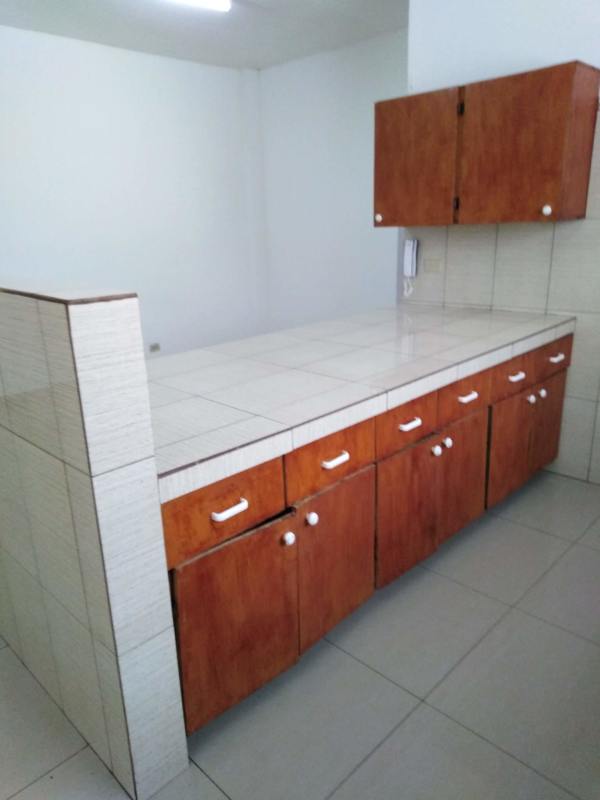 Empty bedroom with large window and built-in wardrobe tile floor in Edificio Ramimar Parque Lefevre Panama