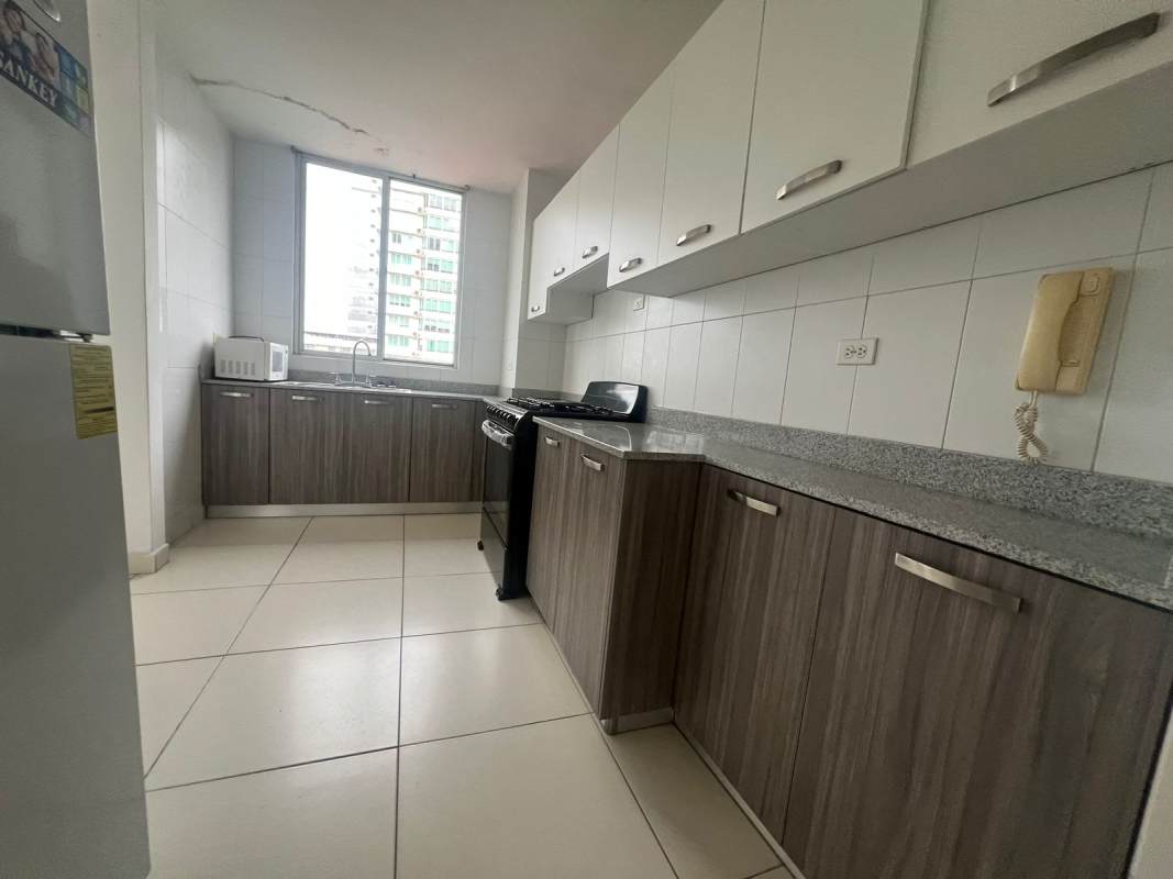 Kitchen with granite counters and plenty of cabinets at PH Plaza 77 Panama