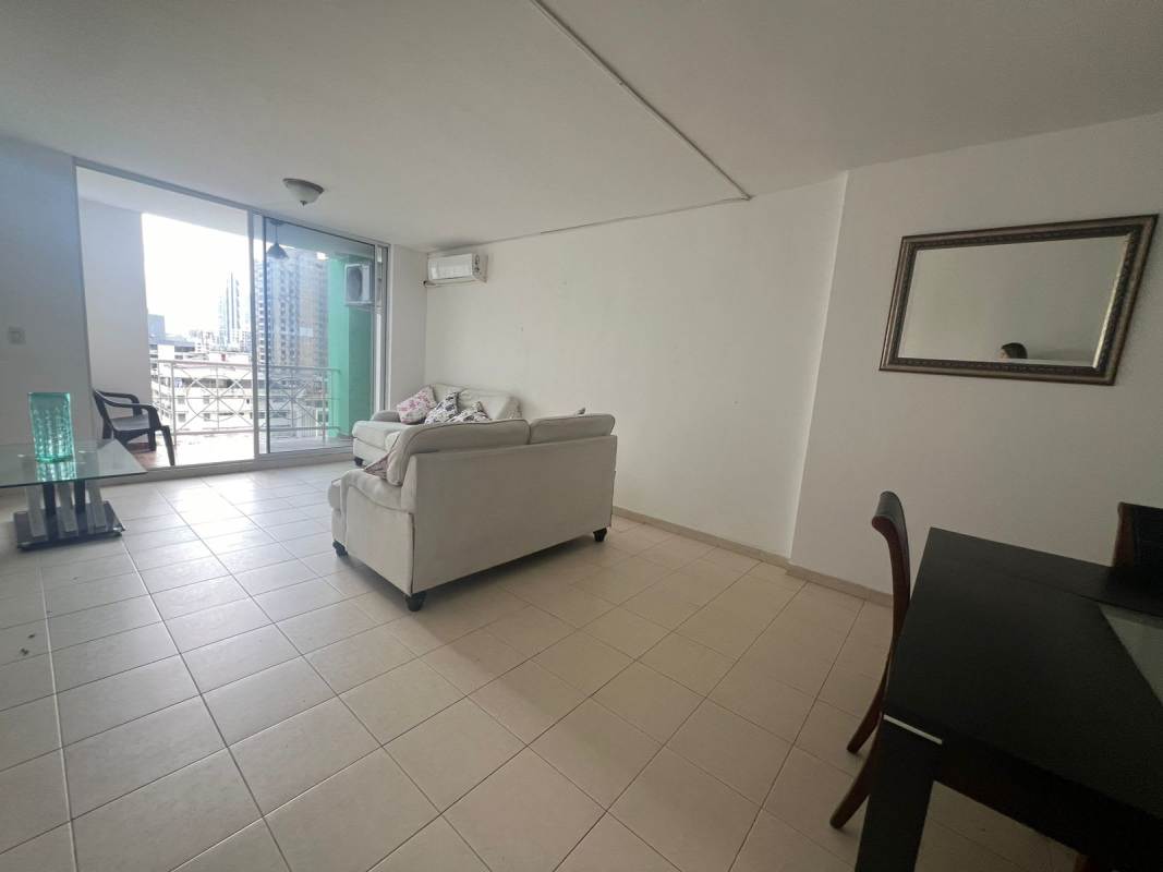 Bright living dining area with balcony access at PH Plaza 77 Via Argentina Panama