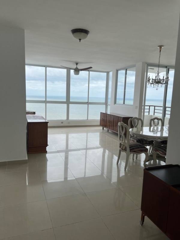 Traditional style kitchen with granite counters, island, wooden cabinets at PH Costa Pacifica