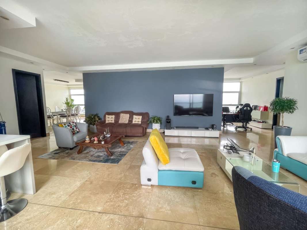 Living room with ocean and city views in luxury Punta Pacifica apartment PH Q Tower Panama