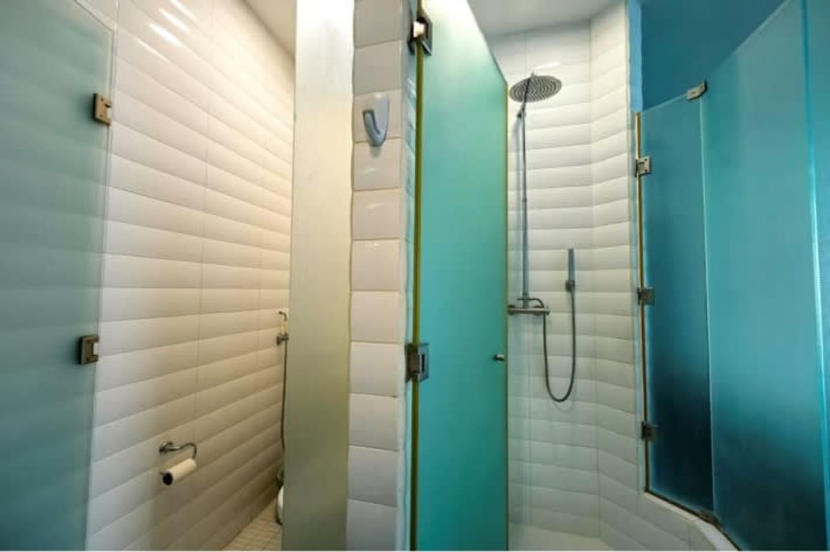 Spacious open-plan living room with floor-to-ceiling windows and ocean skyline Punta Pacifica