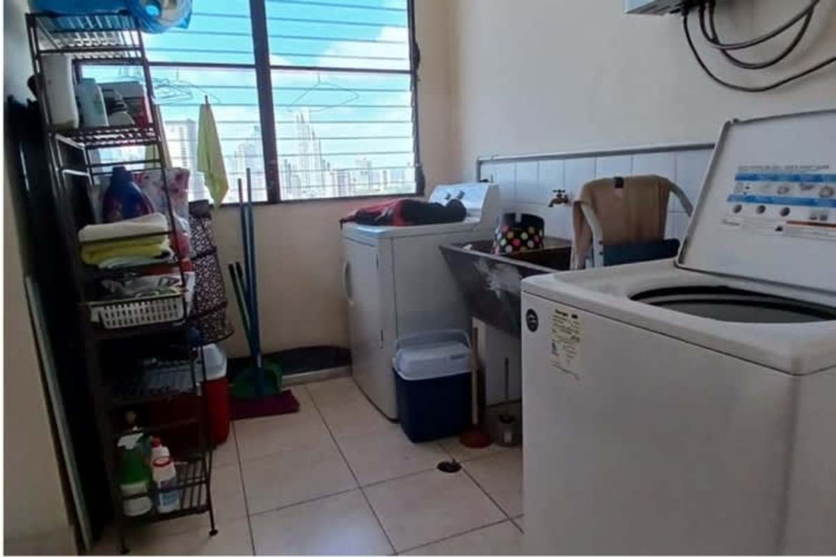 Bedroom with panoramic window and ensuite bathroom in PH Marbella Tower Panama City