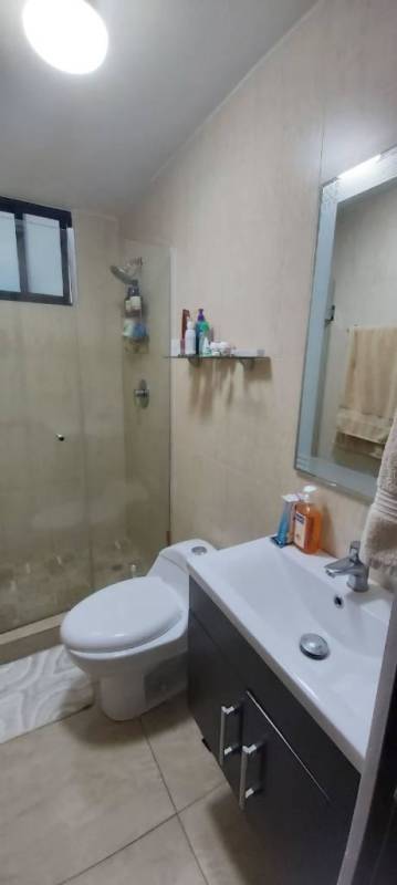 Compact modern bathroom glass walk-in shower vanity PH Terrazas del Rey Panama