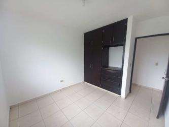 Bright bedroom with ceramic tile, large window in house at Residencial Aqualina David Panama