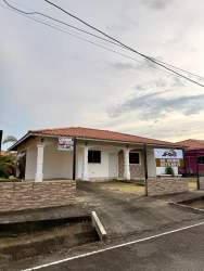 Spacious living room with tile floors and neutral walls in Residencial Aqualina David Chiriquí