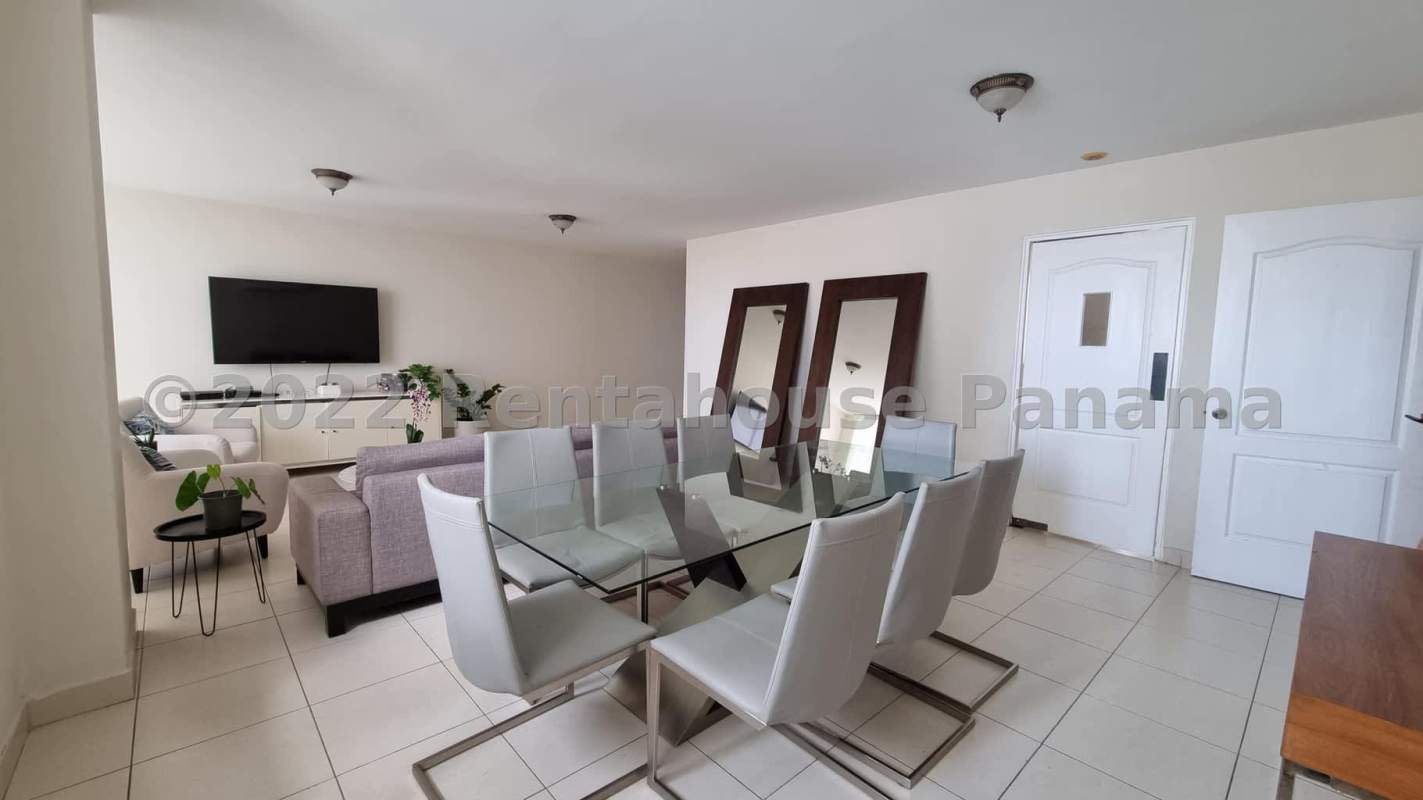 Modern entrance lobby with landscaping and covered driveway PH Courtyard View Panama City