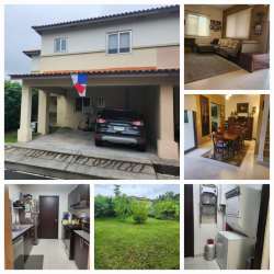Bright open-concept living dining area with large windows in Woodlands Panama Pacifico