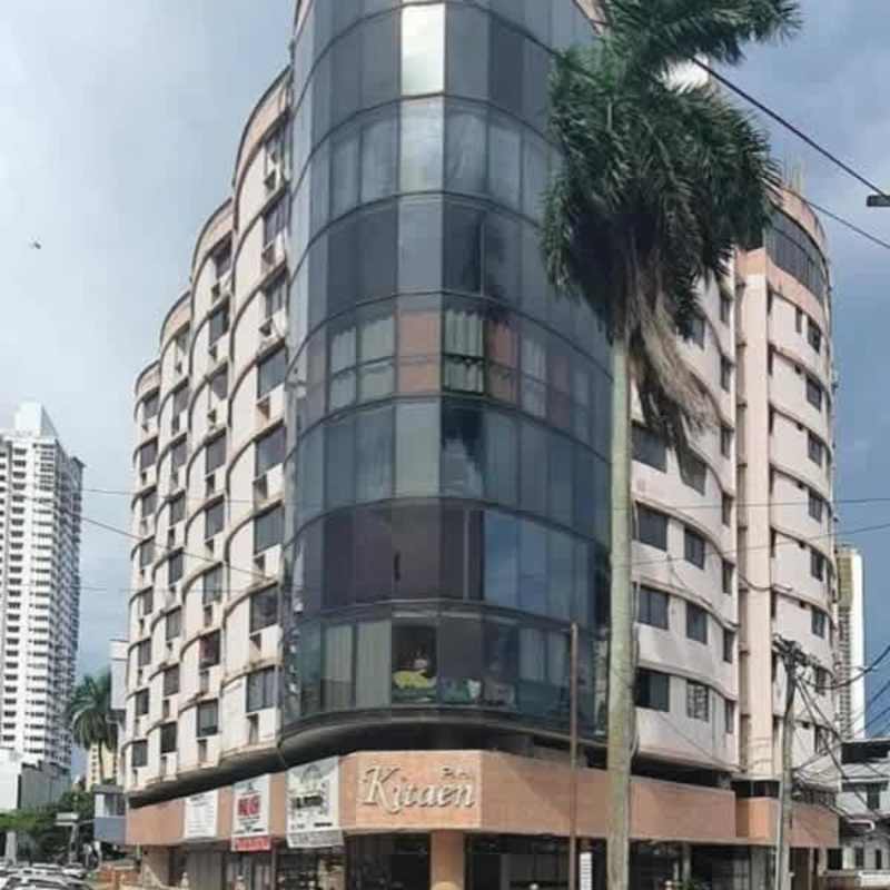 Minimalist commercial interior with multiple doorways and ceramic flooring Panama City